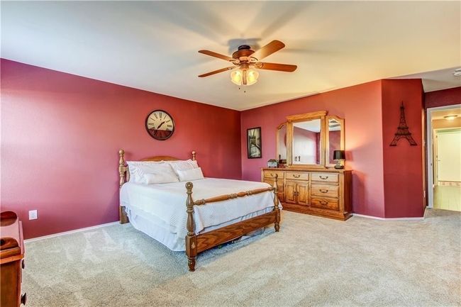 Carpeted bedroom with ceiling fan | Image 14