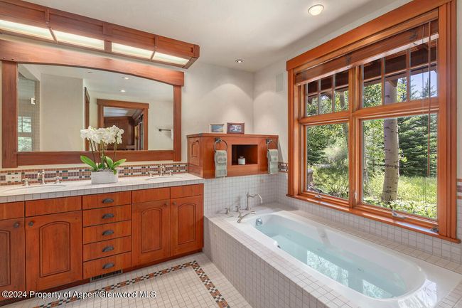 Double vanity, jetted tub and separate steam shower. | Image 35