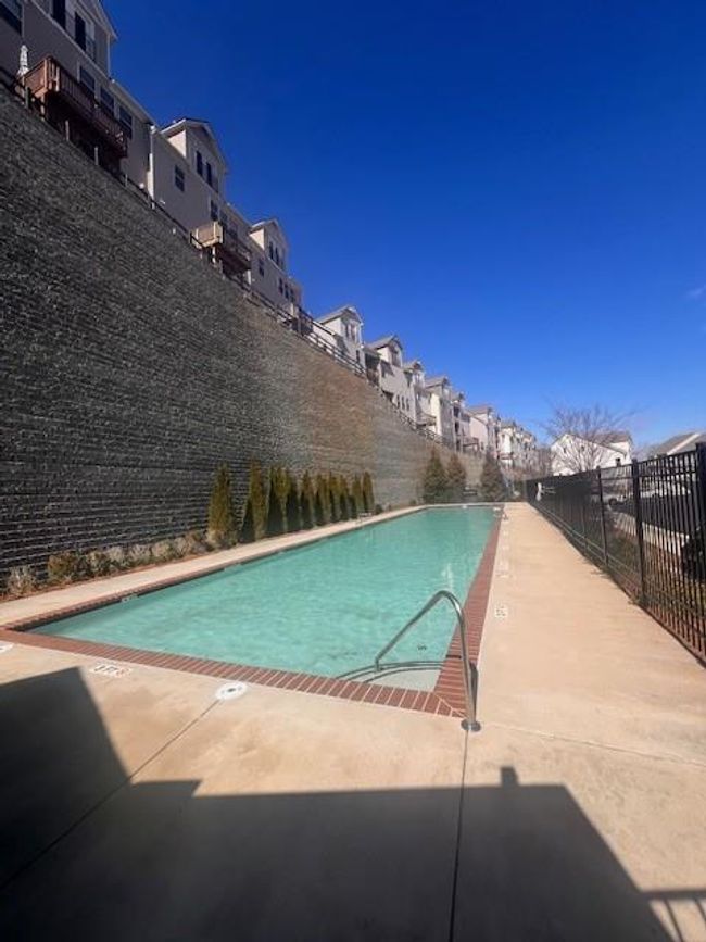 1935 Manor Pointe Dr, Condo with 3 bedrooms, 3 bathrooms and null parking in Cumming GA | Image 58