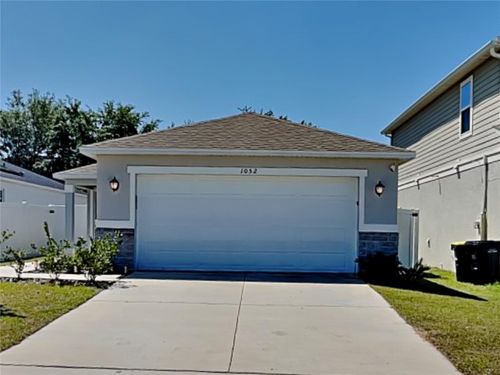 1052 Papaya Cir, DAVENPORT, FL, 33897-6323 | Card Image