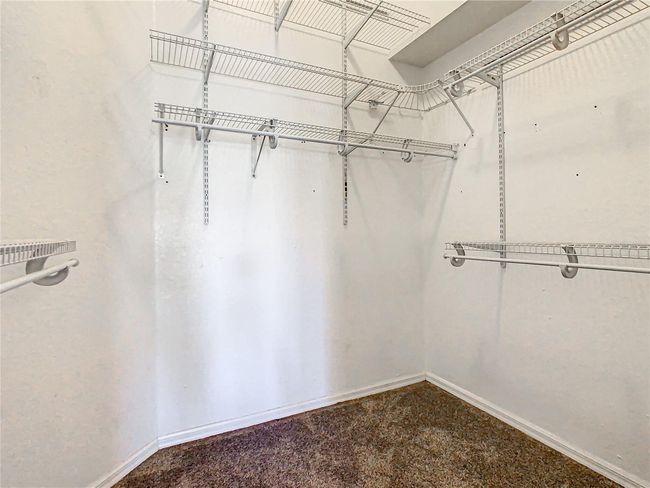 Walk in closet in master bedroom | Image 54