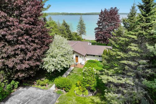 9882 Elk Lake Trl, Williamsburg, MI, 49690-8514 | Card Image