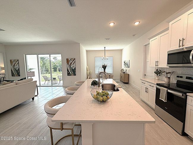 1055 Dolores Rd Ne, House other with 4 bedrooms, 2 bathrooms and null parking in Palm Bay FL | Image 11