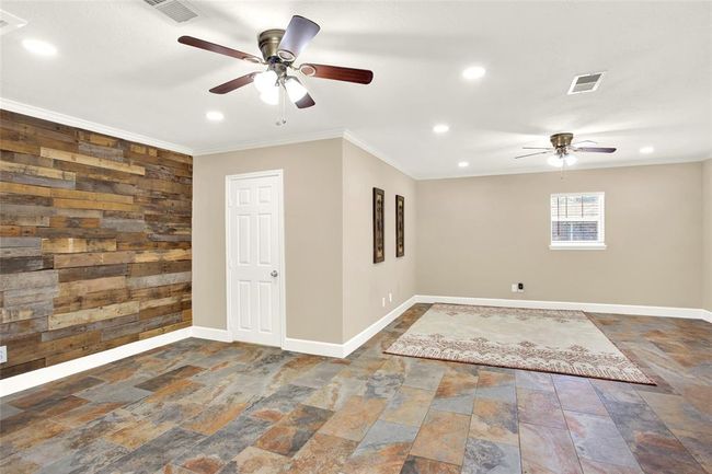 Looking into entire flex space and closet door. | Image 34