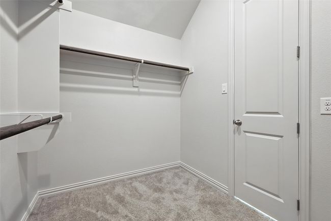 Walk in closet with carpet | Image 27