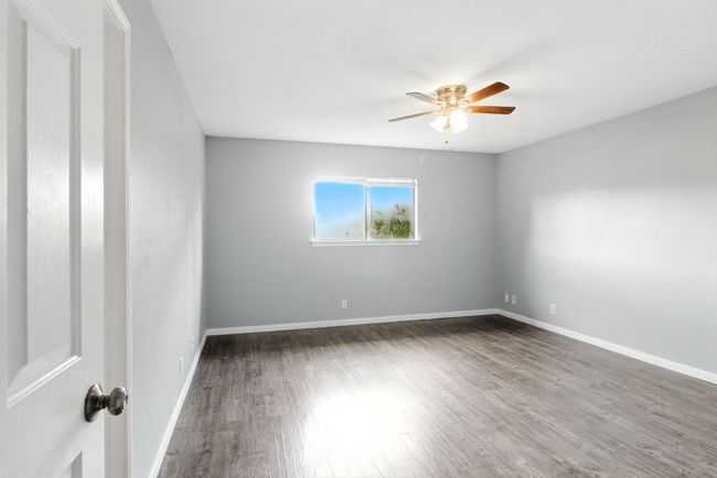 Primary Bedroom taken from entry. The ensuite bathroom is on the laft. | Image 16