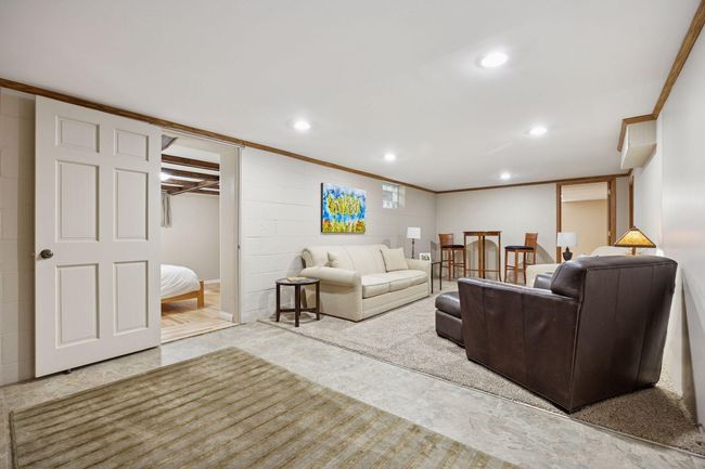 The 4th Bedroom is off of the lower level family room | Image 23