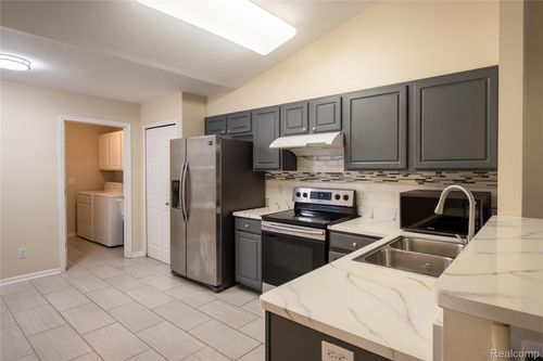 41063 Millbrook Dr, Sterling Heights, MI, 48314-2074 | Card Image