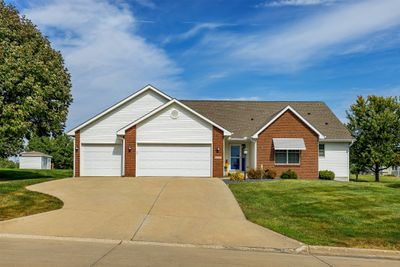 3331 N Blue Heron Circle, Home with 5 bedrooms, 2 bathrooms and null parking in Cumming IA | Image 1