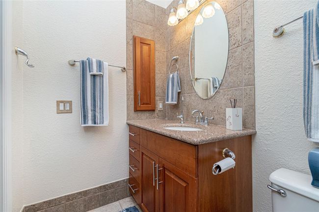 Guest bathroom includes a skylight | Image 47