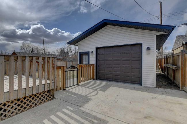 10602 92 B Street, Home with 5 bedrooms, 2 bathrooms and 5 parking in Grande Prairie AB | Image 2