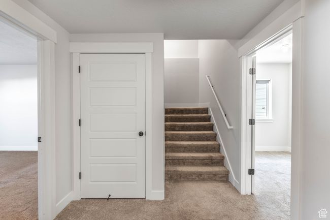Stairway downstairs. Under the stairs storage space. | Image 42