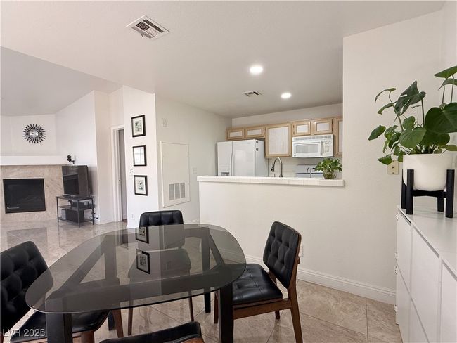 Dining room featuring baseboards, visible vents, and recessed lighting | Image 17