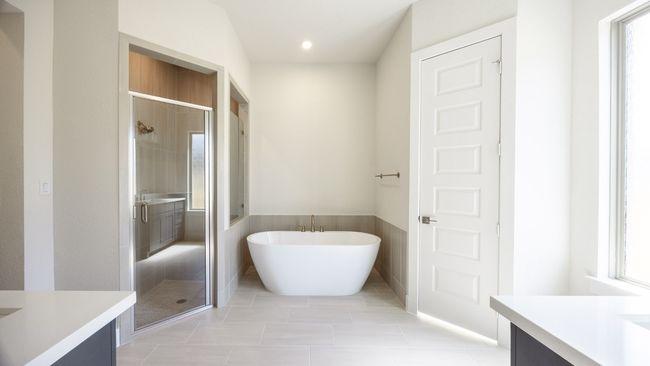 Full bathroom with vanity, a shower stall, a freestanding bath, wainscoting, and recessed lighting | Image 9