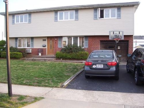1053 Lorraine Dr, Franklin Square, NY, 11010-1839 | Card Image