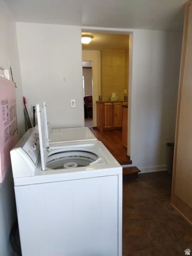 Laundry area featuring washer and clothes dryer and laundry area | Image 6