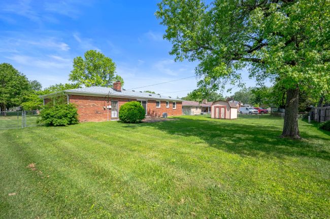 Fenced in yard with mature trees | Image 19