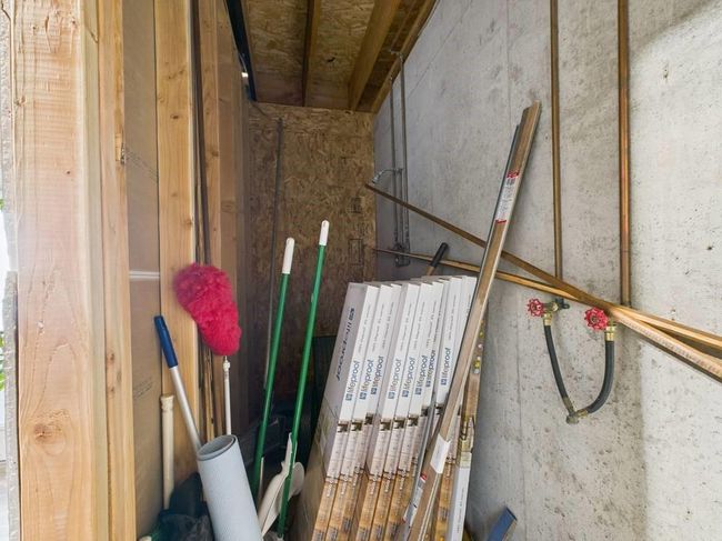 Start of 3rd bathroom with plumbing for shower, sink and toilet | Image 65