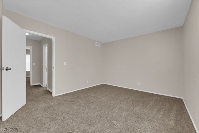 Carpeted spare room featuring baseboards | Image 13