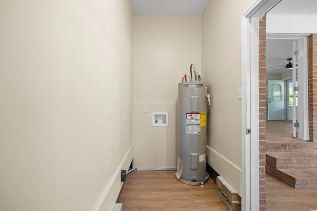 Utilities featuring electric water heater | Image 14