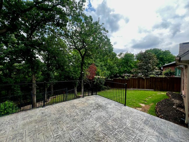 View of patio featuring a fenced backyard | Image 29