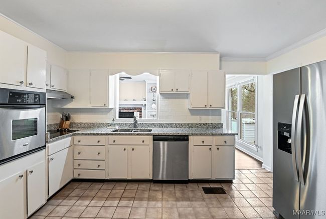 Plenty of cabinets, granite countertops | Image 13