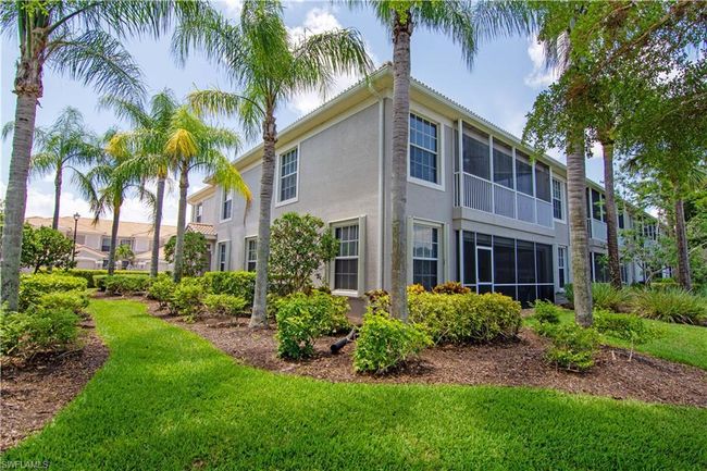 Beautiful tropical landscaping surrounds your new home. | Image 4