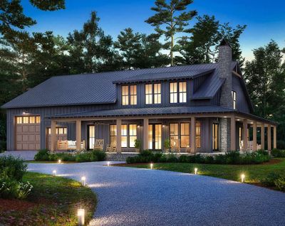 Modern farmhouse with covered porch and a garage | Image 1