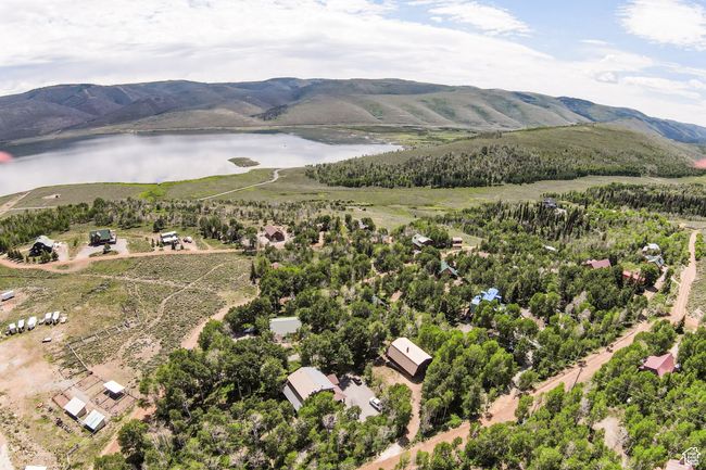 Bird's eye view of a water and mountain view | Image 39