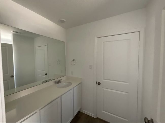 Bathroom featuring vanity and wood finished floors | Image 14