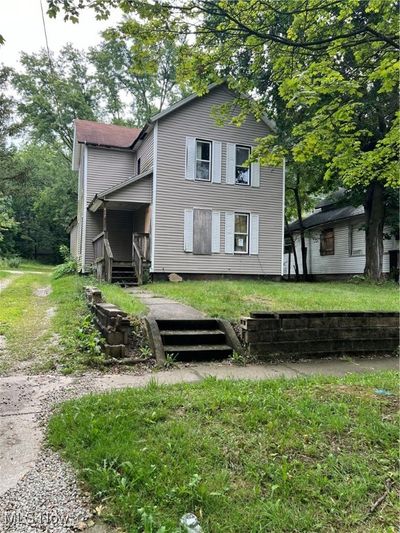 Back of house featuring a yard | Image 1