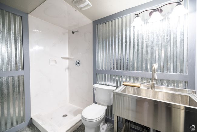 Full bathroom with toilet and a shower stall | Image 81