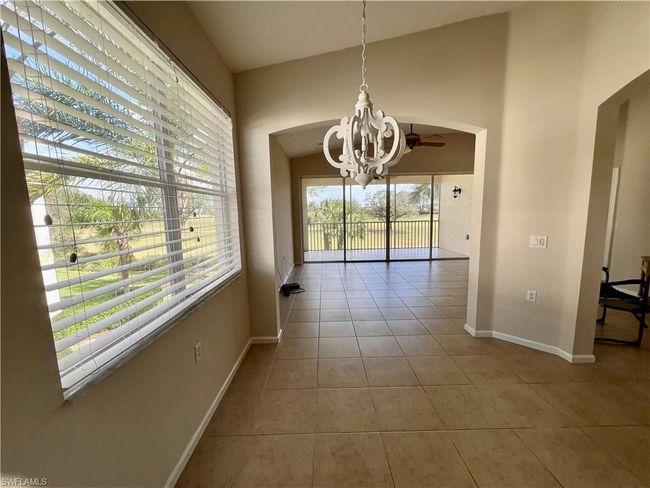 View without furniture from dinette to living room and lanai | Image 12