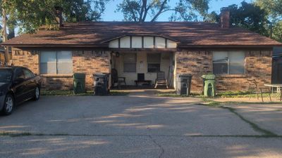 Single story home with a porch | Image 1