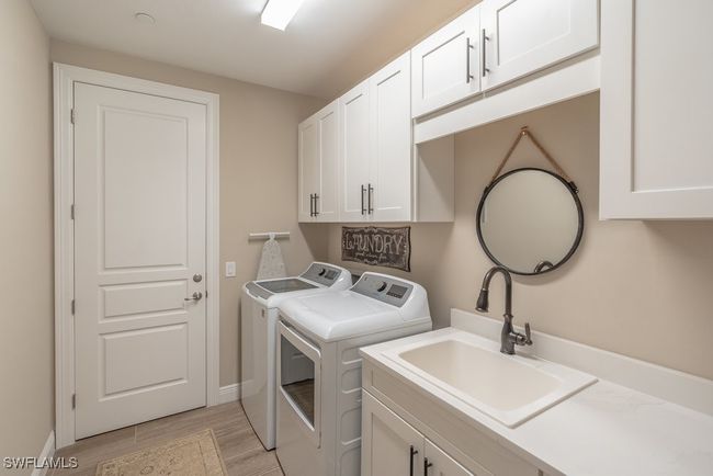 Laundry room with utility tub | Image 27