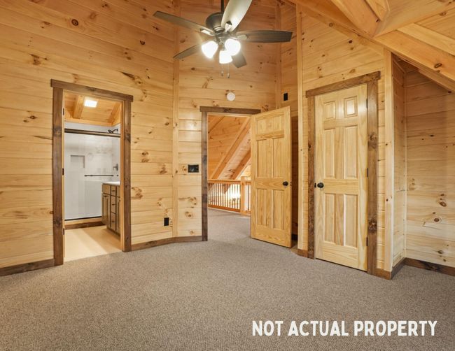 Bedroom is off the loft and has attached full bathroom | Image 44