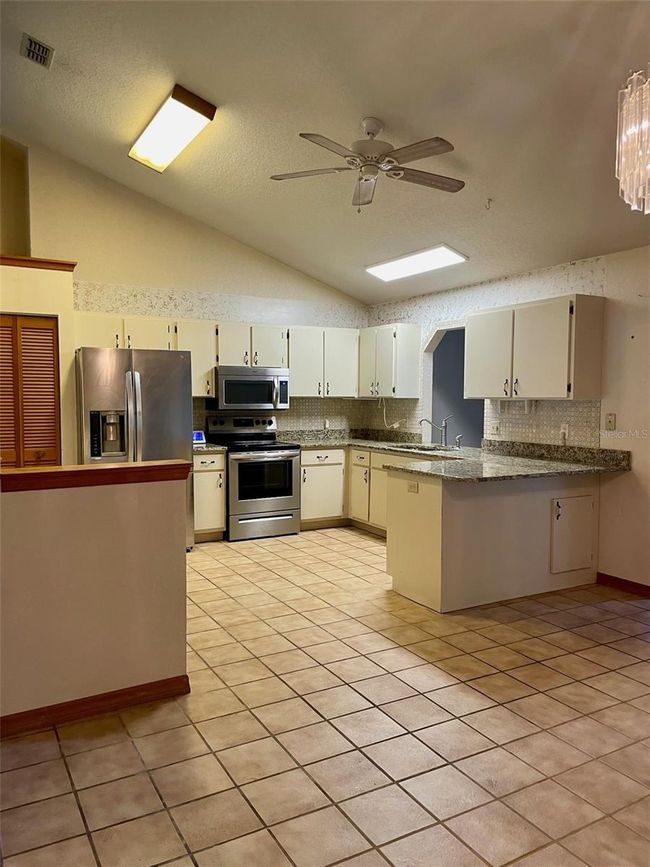 1112 Ne 130 Th Ter, House other with 3 bedrooms, 2 bathrooms and null parking in SILVER SPRINGS FL | Image 25