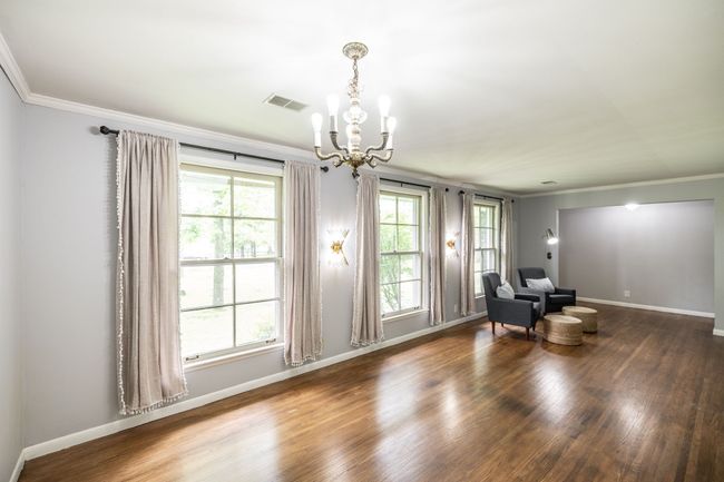 However, the flexibility this room offers allows you to choose. Maybe you'd rather use it as a living room, office, or library. | Image 22
