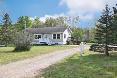 Front of House with Driveway. Buildings are on your right..jpg | Image 2