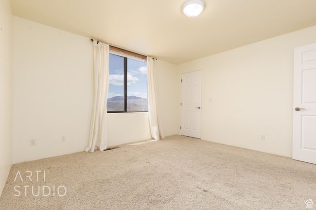 Empty room featuring visible vents and carpet | Image 37