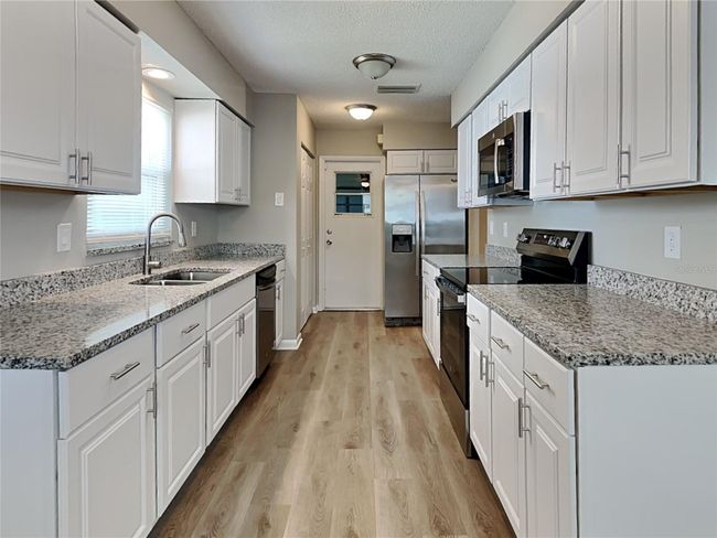 4399 Crescent Rd, House other with 3 bedrooms, 3 bathrooms and null parking in Spring Hill FL | Image 7