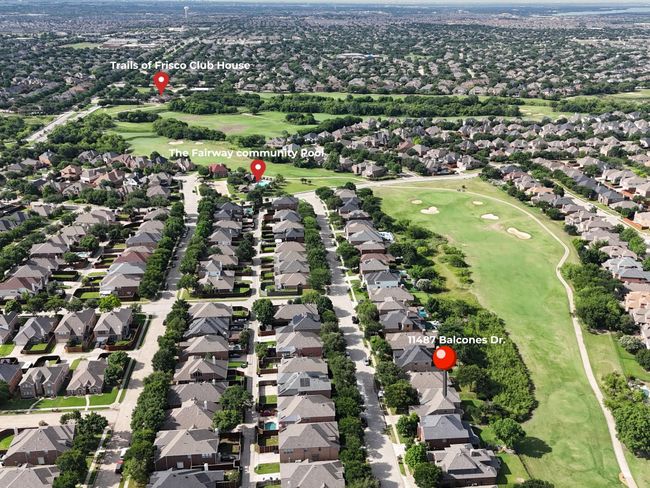 Aerial overview of property's location with nearby suburban area and a golf course | Image 32