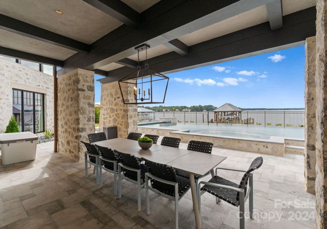 Lake-level covered patio. | Image 41