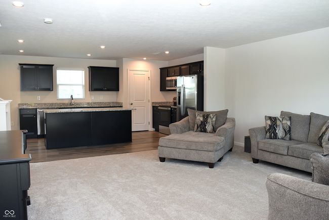 great room looking into kitchen | Image 15