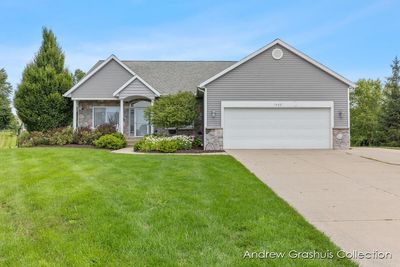 7402 Missoula Drive Se, House other with 4 bedrooms, 3 bathrooms and null parking in Caledonia MI | Image 1