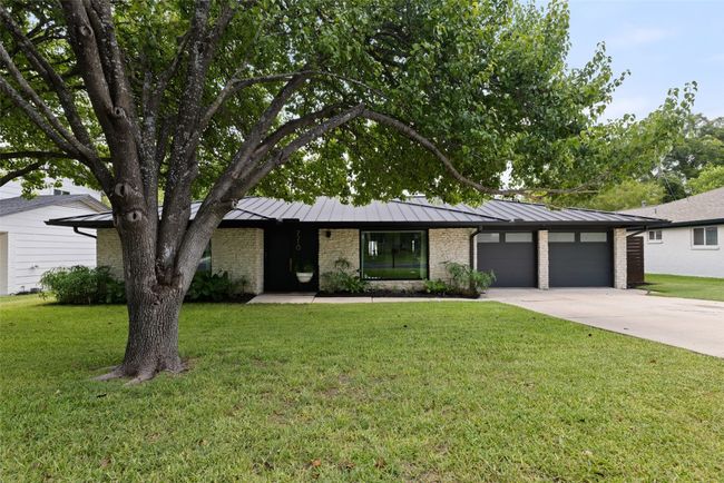 A standing seam metal roof adds striking curb appeal. | Image 39