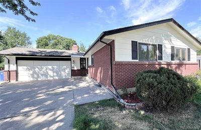 6873 Oak Way, House other with 3 bedrooms, 2 bathrooms and 2 parking in Arvada CO | Image 1