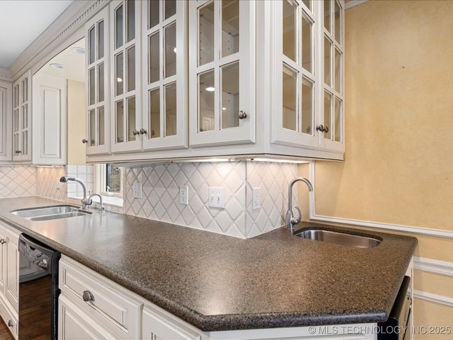 Wet bar at end of counter serves Gathering Room | Image 18