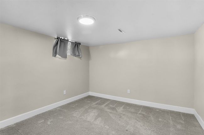 Empty room with baseboards and carpet floors | Image 29