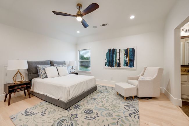 Bedroom featuring light wood-type flooring, baseboards, recessed lighting, and a ceiling fan | Image 27